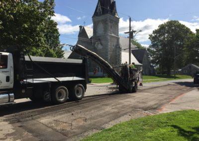 Partial depth grinding of asphalt